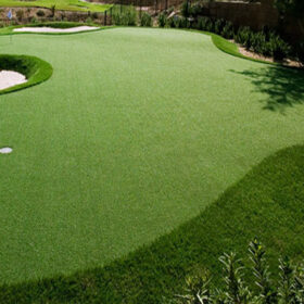 a golf course with a hole in the middle