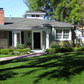 a house with a lawn and a lawn